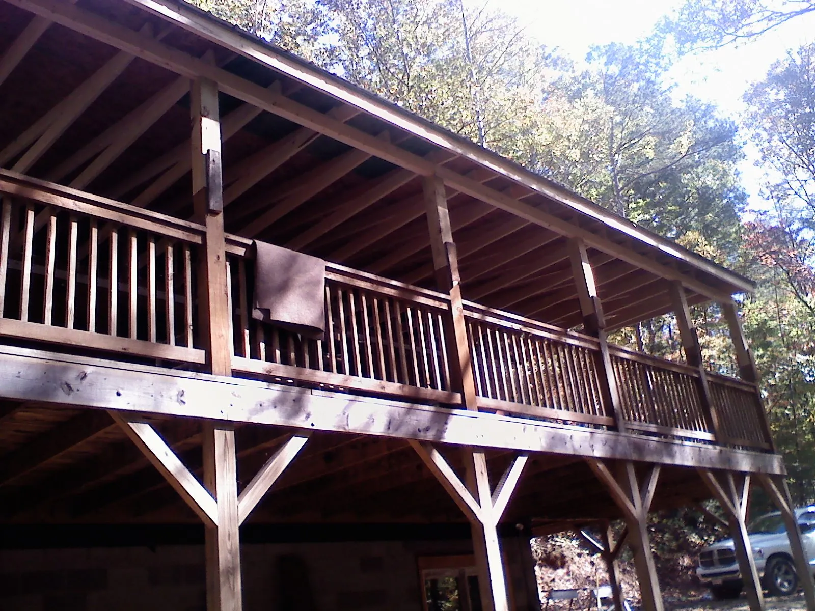 Timber framing under a new elevated porch and deck — Roof Leak Repair in Charlo by Roofing Brothers